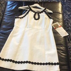 Taylor white dress with navy blue trim
